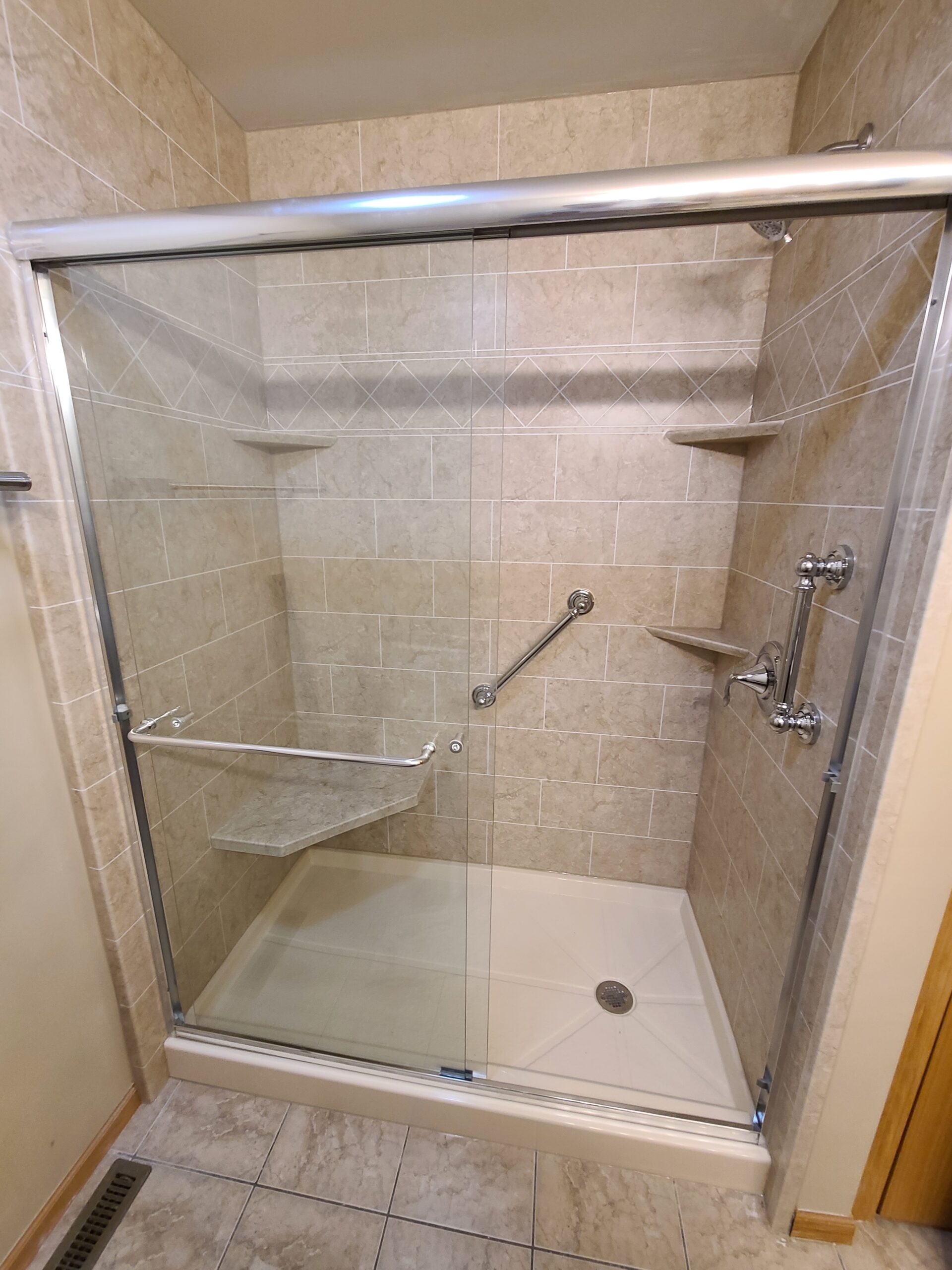 Completed bathroom remodel with updated shower and vanity