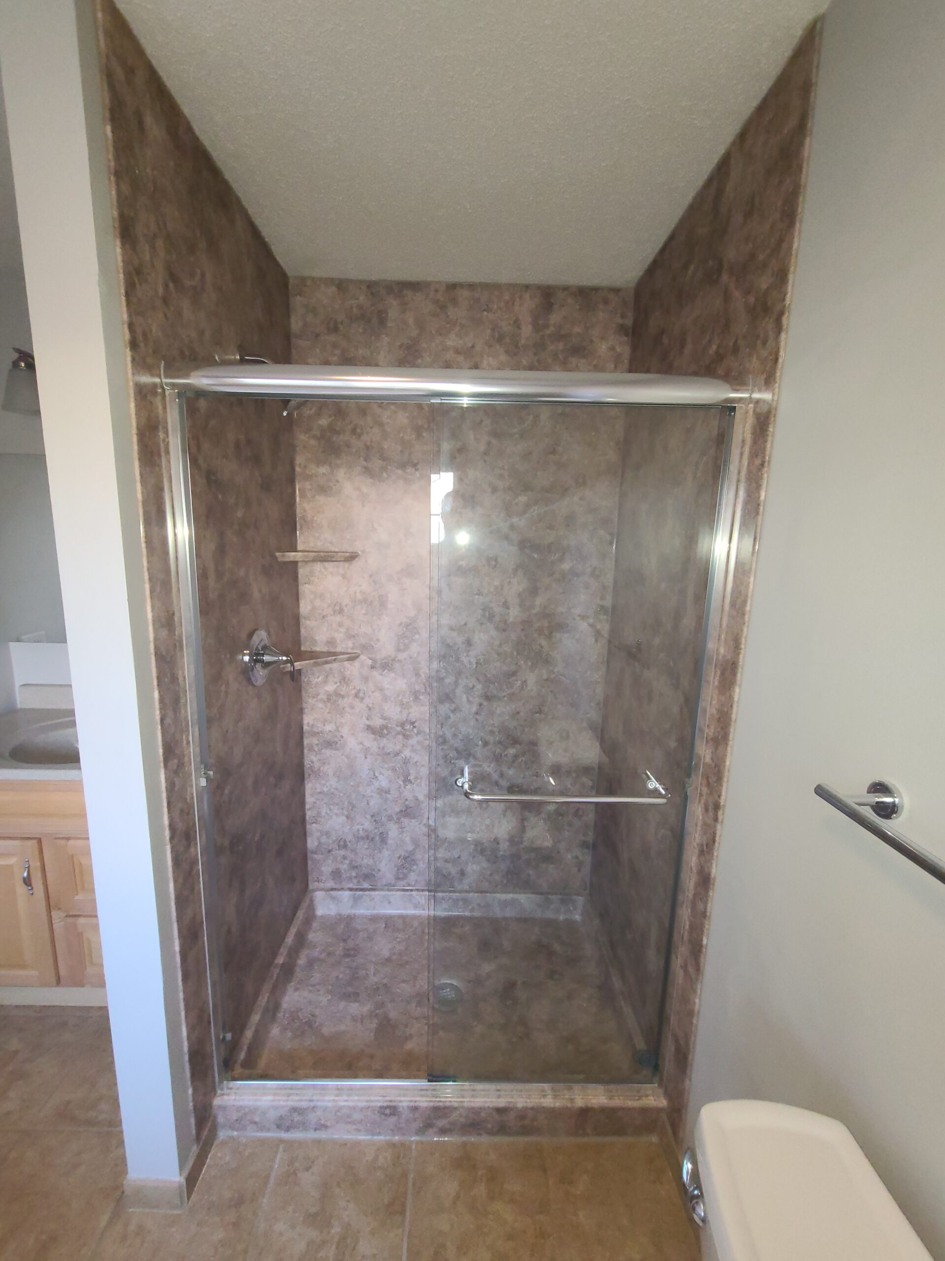 Updated bathroom with modern shower and trim details