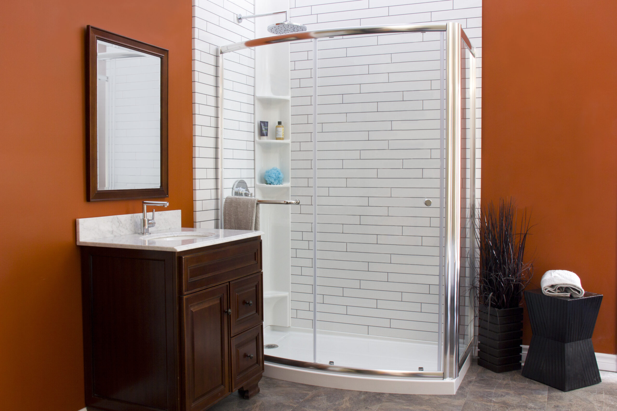 Bathroom remodel with bright tile and warm wall color